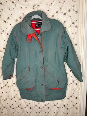 IZZI Women's Teal Puffer Jacket with Red Trim